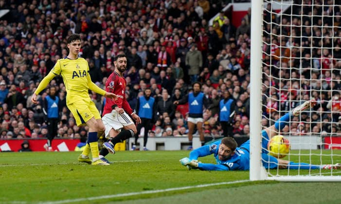 Manchester, England, 7th February 2026. Bruno Fernandes of Manchester United, ManU (C) scores their second goal during the Manchester United vs Tottenham Hotspur Premier League match at Old Trafford, Manchester. Picture credit should read: Andrew Yates Sportimage EDITORIAL USE ONLY. No use with unauthorised audio, video, data, fixture lists, club league logos or live services. Online in-match use limited to 120 images, no video emulation. No use in betting, games or single club league player publications. SPI_094_AY_Man_Utd_Spurs SPI-4511-0094