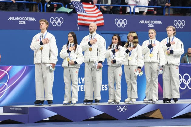 February 8, 2026, Milan, Lombardy, Italy: EVAN BATES, MADISON CHOCK, DANNY O SHEA, ELLIE KAM, ALYSA LIU, AMBER GLENN and ILIA MALININ of Team USA celebrate winning the gold medal during the Victory Ceremony of the Figure skating, Eiskunstlauf Team Event at the Milano Cortina 2026 Winter Olympic Games, Olympische Spiele, Olympia, OS Milan Italy - ZUMAc179 20260208_oly_c179_133 Copyright: xMickaelxChavetx