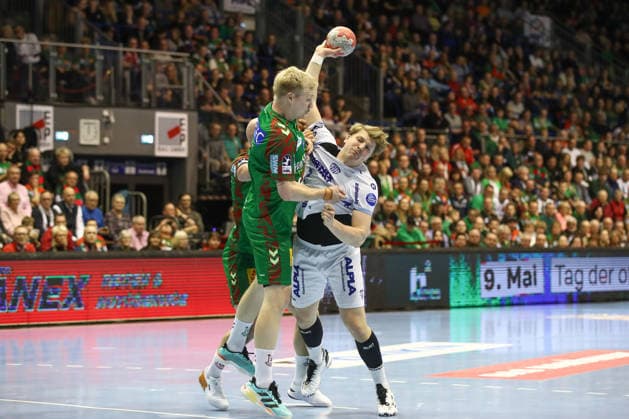 11.02.2026, xtgx, Handball, Daikin HBL, SC Magdeburg - TBV Lemgo v.l. Magnus Saugstrup (Magdeburg, 23), Lukas Hutecek (Lemgo, 2) Zweikampf, Duell, Kampf, tackle Magdeburg