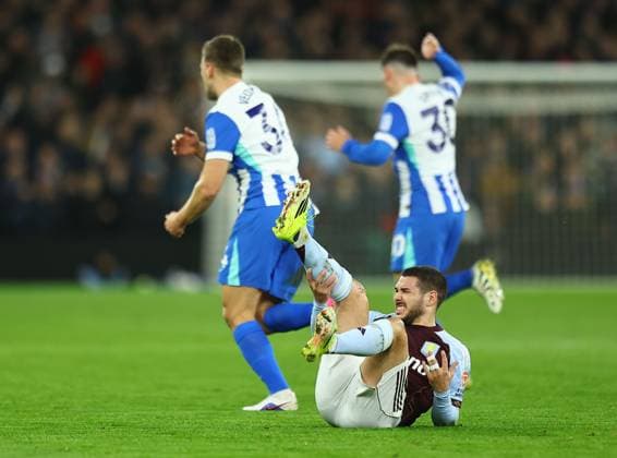 Emiliano Buendia of Aston Villa seen in pain after a tackle from Joel Veltman of Brighton & Hove Albion Aston Villa v Brighton and Hove Albion, Premier League, Football, Villa Park, Birmingham, UK - 11 Feb 2026Birmingham Villa Park United Kingdom EDITORIAL USE ONLY No use with unauthorised audio, video, data, fixture lists, club league logos or live services. Online in-match use limited to 120 images, no video emulation. No use in betting, games or single club league player publications. Copyright: xMichaelxZemanek Shutterstockx 16540332ad