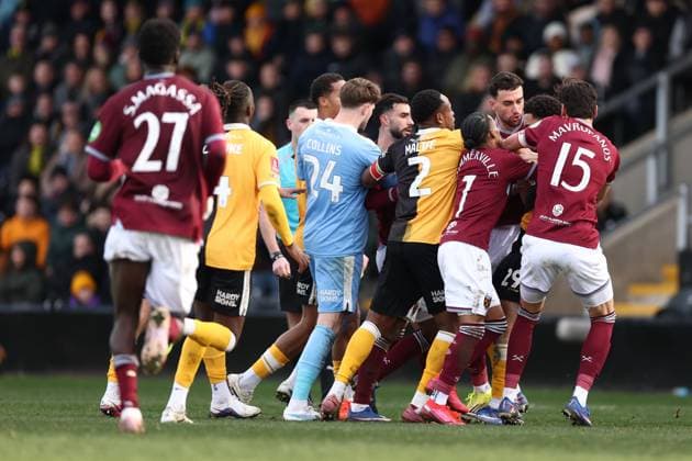 Burton Albion and West Ham players clash Burton Albion v West Ham United, Emirates FA Cup, Fourth Round, Football, Pirelli Stadium, Burton upon Trent, UK - 14 Feb 2026Burton upon Trent Pirelli Stadium United Kingdom EDITORIAL USE ONLY No use with unauthorised audio, video, data, fixture lists, club league logos or live services. Online in-match use limited to 120 images, no video emulation. No use in betting, games or single club league player publications. Copyright: xRyanxBrowne Shutterstockx 16608141bm