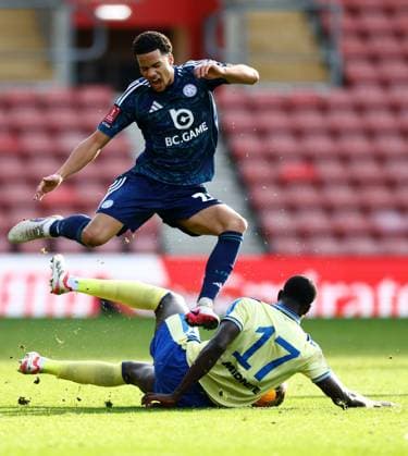 Divine Mukasa of Leicester City is tackled by Joshua Quarshie of Southampton. Southampton v Leicester City, Emirates FA Cup, Fourth Round, Football, St Mary s Stadium, Southampton, UK - 14 Feb 2026Southampton St Mary s Stadium United Kingdom EDITORIAL USE ONLY No use with unauthorised audio, video, data, fixture lists, club league logos or live services. Online in-match use limited to 120 images, no video emulation. No use in betting, games or single club league player publications. Copyright: xJamesxMarsh Shutterstockx 16608181y