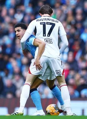 Rico Lewis of Manchester City and Josh Austerfield of Salford City Manchester City v Salford City, Emirates FA Cup, Fourth Round, Football, Etihad Stadium, Manchester, UK - 14 Feb 2026Manchester Etihad Stadium United Kingdom EDITORIAL USE ONLY No use with unauthorised audio, video, data, fixture lists, club league logos or live services. Online in-match use limited to 120 images, no video emulation. No use in betting, games or single club league player publications. Copyright: xMattxWest Shutterstockx 16608276u