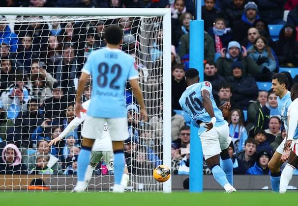 Marc Guehi of Manchester City scores a goal to make it 2-0 Manchester City v Salford City, Emirates FA Cup, Fourth Round, Football, Etihad Stadium, Manchester, UK - 14 Feb 2026Manchester Etihad Stadium United Kingdom EDITORIAL USE ONLY No use with unauthorised audio, video, data, fixture lists, club league logos or live services. Online in-match use limited to 120 images, no video emulation. No use in betting, games or single club league player publications. Copyright: xMattxWest Shutterstockx 16608276ac