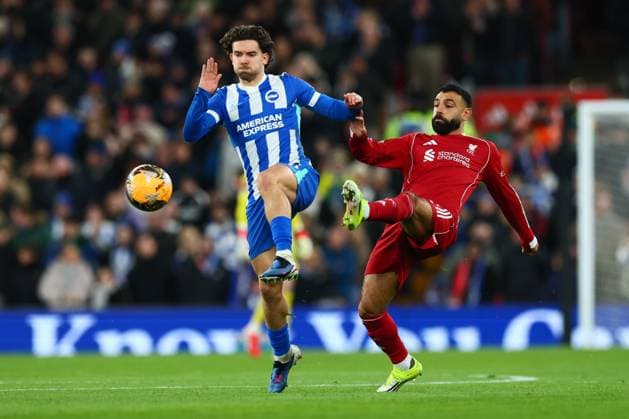 Ferdi Kadioglu of Brighton & Hove Albion and Mohamed Salah of Liverpool Liverpool v Brighton and Hove Albion, Emirates FA Cup, Fourth Round, Football, Anfield, Liverpool, UK - 14 Feb 2026Liverpool Anfield United Kingdom EDITORIAL USE ONLY No use with unauthorised audio, video, data, fixture lists, club league logos or live services. Online in-match use limited to 120 images, no video emulation. No use in betting, games or single club league player publications. Copyright: xPaulxCurrie Shutterstockx 16608525r