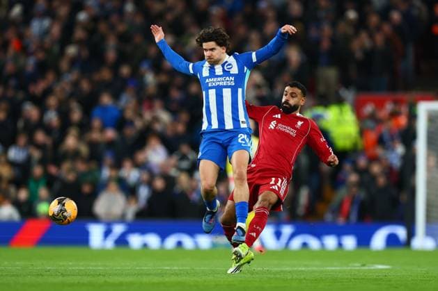 Ferdi Kadioglu of Brighton & Hove Albion and Mohamed Salah of Liverpool Liverpool v Brighton and Hove Albion, Emirates FA Cup, Fourth Round, Football, Anfield, Liverpool, UK - 14 Feb 2026Liverpool Anfield United Kingdom EDITORIAL USE ONLY No use with unauthorised audio, video, data, fixture lists, club league logos or live services. Online in-match use limited to 120 images, no video emulation. No use in betting, games or single club league player publications. Copyright: xPaulxCurrie Shutterstockx 16608525t