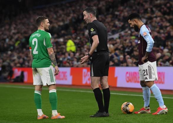 Referee Chris Kavanagh speaks with Kieran Trippier of Newcastle United Aston Villa v Newcastle United, Emirates FA Cup, Fourth Round, Football, Villa Park, Birmingham, UK - 14 Feb 2026Birmingham Villa Park United Kingdom EDITORIAL USE ONLY No use with unauthorised audio, video, data, fixture lists, club league logos or live services. Online in-match use limited to 120 images, no video emulation. No use in betting, games or single club league player publications. Copyright: xAlanxWalter Shutterstockx 16608496cs