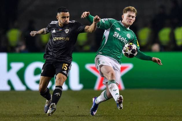 Lewis Hall of Newcastle United Football Club clears the ball after pressure from Leandro Andrade of Qarabag FK Qarabag v Newcastle United, UEFA Champions League, Knockout Round Play-Offs, First Leg, Football, Tofig Bahramov Republican Stadium, Baku, Azerbaijan - 18 Feb 2026Baku Tofig Bahramov Republican Stadiu Azerbaijan EDITORIAL USE ONLY No use with unauthorised audio, video, data, fixture lists, club league logos or live services. Online in-match use limited to 120 images, no video emulation. No use in betting, games or single club league player publications. Copyright: xElmirxKarimov Shutterstockx 16660416ai