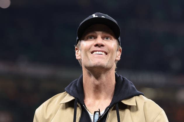 Milan, Italy, 18th February 2026. Former NFL, American Football Herren, USA American football quarterback Tom Brady prior to the AC Milan vs Como 1907 Serie A match at Giuseppe Meazza, Milan. Picture credit should read: Jonathan Moscrop Sportimage EDITORIAL USE ONLY. No use with unauthorised audio, video, data, fixture lists, club league logos or live services. Online in-match use limited to 120 images, no video emulation. No use in betting, games or single club league player publications. SPI_008_MILAN_COMO_ SPI-4548-0008