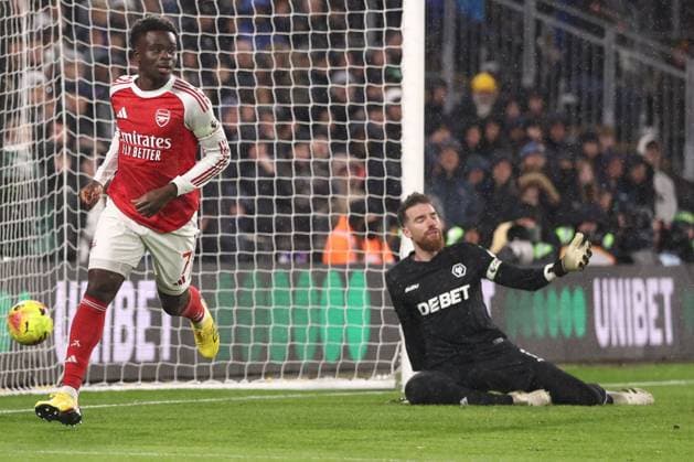 Bukayo Saka of Arsenal scores to make it 0-1 and celebrates Wolverhampton Wanderers v Arsenal, Premier League, Football, Molineux, Wolverhampton, UK - 18 Feb 2026Wolverhampton Molineux United Kingdom EDITORIAL USE ONLY No use with unauthorised audio, video, data, fixture lists, club league logos or live services. Online in-match use limited to 120 images, no video emulation. No use in betting, games or single club league player publications. Copyright: xRyanxBrowne Shutterstockx 16660426ar