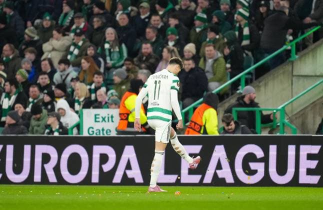 Tomas Cvancara of Celtic removes balls thrown on to the pitch by Celtic fans as protest against the Celtic FC board. Celtic v Stuttgart, UEFA Europa League, Knockout Round Play Offs, First Leg, Football, Celtic Park, Glasgow, Scotland, UK - 19 Feb 2026Glasgow Celtic Park Scotland United Kingdom EDITORIAL USE ONLY No use with unauthorised audio, video, data, fixture lists, club league logos or live services. Online in-match use limited to 120 images, no video emulation. No use in betting, games or single club league player publications. Copyright: xStuartxWallace Shutterstockx 16674319t