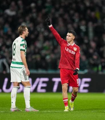 Bilal El Khannouss of Stuttgart celebrates scoring his 2nd goal of the game to give Stuttgart a 1-2 lead, with Celtic s goalscorer Benjamin Nygren of Celtic, left. Celtic v Stuttgart, UEFA Europa League, Knockout Round Play Offs, First Leg, Football, Celtic Park, Glasgow, Scotland, UK - 19 Feb 2026Glasgow Celtic Park Scotland United Kingdom EDITORIAL USE ONLY No use with unauthorised audio, video, data, fixture lists, club league logos or live services. Online in-match use limited to 120 images, no video emulation. No use in betting, games or single club league player publications. Copyright: xStuartxWallace Shutterstockx 16674319av