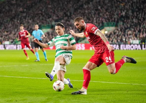 Daizen Maeda of Celtic & Jeff Chabot of Stuttgart Celtic v Stuttgart, UEFA Europa League, Knockout Round Play Offs, First Leg, Football, Celtic Park, Glasgow, Scotland, UK - 19 Feb 2026Glasgow Celtic Park Scotland United Kingdom EDITORIAL USE ONLY No use with unauthorised audio, video, data, fixture lists, club league logos or live services. Online in-match use limited to 120 images, no video emulation. No use in betting, games or single club league player publications. Copyright: xStuartxWallace Shutterstockx 16674319ba