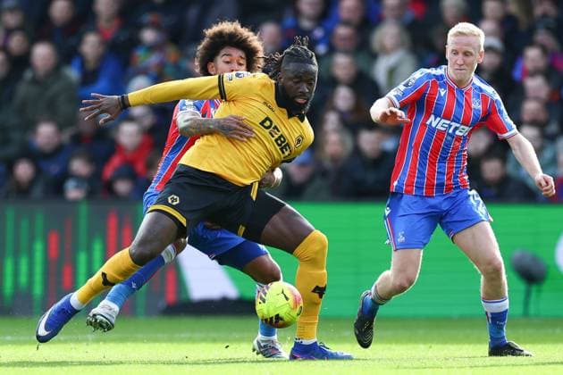 Tolu Arokodare of Wolverhampton Wanderers under pressure from Chris Richards of Crystal Palace and Will Hughes of Crystal Palace Crystal Palace v Wolverhampton Wanderers, Premier League, Football, Selhurst Park, London, UK - 22 Feb 2026London Selhurst Park United Kingdom EDITORIAL USE ONLY No use with unauthorised audio, video, data, fixture lists, club league logos or live services. Online in-match use limited to 120 images, no video emulation. No use in betting, games or single club league player publications. Copyright: xSimonxDael Shutterstockx 16681548ai