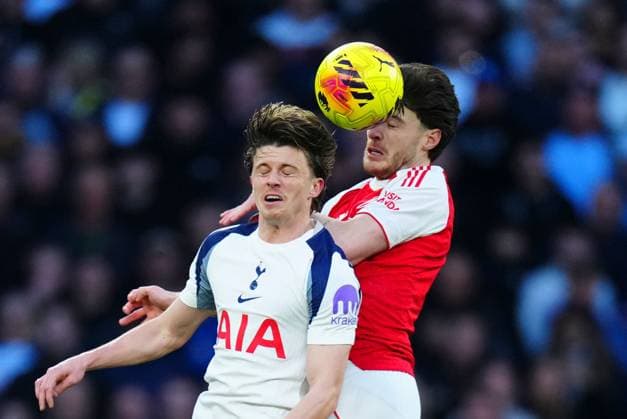 Conor Gallagher of Tottenham Hotspur battles with Declan Rice of Arsenal Tottenham Hotspur v Arsenal, Premier League, Football, Tottenham Hotspur Stadium, London, UK - 22 Feb 2026London Tottenham Hotspur Stadium United Kingdom EDITORIAL USE ONLY No use with unauthorised audio, video, data, fixture lists, club league logos or live services. Online in-match use limited to 120 images, no video emulation. No use in betting, games or single club league player publications. Copyright: xJavierxGarcia Shutterstockx 16681578t