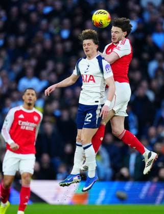 Conor Gallagher of Tottenham Hotspur battles with Declan Rice of Arsenal Tottenham Hotspur v Arsenal, Premier League, Football, Tottenham Hotspur Stadium, London, UK - 22 Feb 2026London Tottenham Hotspur Stadium United Kingdom EDITORIAL USE ONLY No use with unauthorised audio, video, data, fixture lists, club league logos or live services. Online in-match use limited to 120 images, no video emulation. No use in betting, games or single club league player publications. Copyright: xJavierxGarcia Shutterstockx 16681578cl