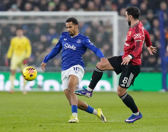 Liverpool, England, 23rd February 2026. Iliman Ndiaye of Everton tackled by Bruno Fernandes of Manchester United, ManU during the Everton vs Manchester United Premier League match at Hill Dickinson Stadium, Liverpool. Picture credit should read: Andrew Yates Sportimage EDITORIAL USE ONLY. No use with unauthorised audio, video, data, fixture lists, club league logos or live services. Online in-match use limited to 120 images, no video emulation. No use in betting, games or single club league player publications. SPI_020_AY_Everton_Man_Utd SPI-4547-0020