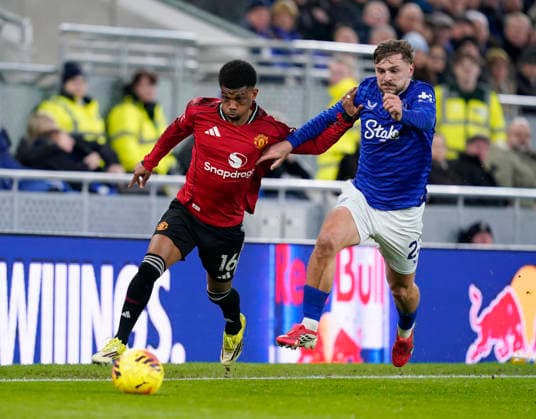 Liverpool, England, 23rd February 2026. Amad Diallo of Manchester United, ManU and Kiernan Dewsbury-Hall of Everton during the Everton vs Manchester United Premier League match at Hill Dickinson Stadium, Liverpool. Picture credit should read: Andrew Yates Sportimage EDITORIAL USE ONLY. No use with unauthorised audio, video, data, fixture lists, club league logos or live services. Online in-match use limited to 120 images, no video emulation. No use in betting, games or single club league player publications. SPI_044_AY_Everton_Man_Utd SPI-4547-0044