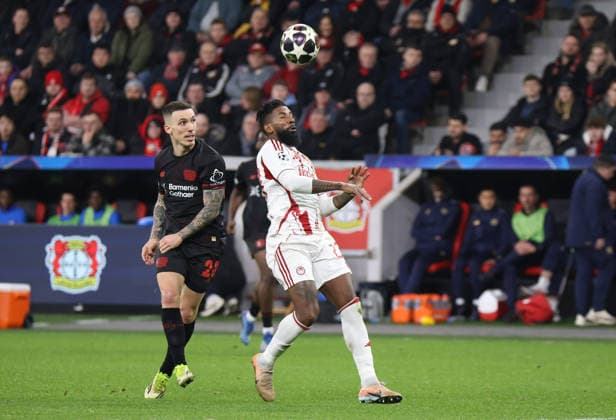 v.l. Alejandro Grimaldo (Bayer Leverkusen, 20), Rodinei (Olympiakos Piraeus 23) GER, Bayer 04 Leverkusen vs. Olympiakos Piraeus, Fussball, Champions League, Play-offs, Rueckspiel, Spielzeit 2025 2026, 24.02.2026 GER, Bayer 04 Leverkusen vs. Olympiakos Piraeus, Fussball, Champions League, Play-offs, Rueckspiel, Spielzeit 2025 2026, 24.02.2026 Leverkusen Copyright: xEibner-Pressefotox xThomasxStoecx EP_TSR