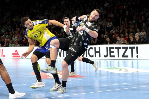 DEU, EHF Champions League, Fuechse Berlin vs.Industria Kielce, 26.02.2026, Max-Schmeling-Halle, Berlin, DEU, EHF Champions League, Fuechse Berlin vs.Industria Kielce, im Bild Mijajlo Marsenic (Fuechse Berlin 93), Theo Monar (Industria Kielce 97)