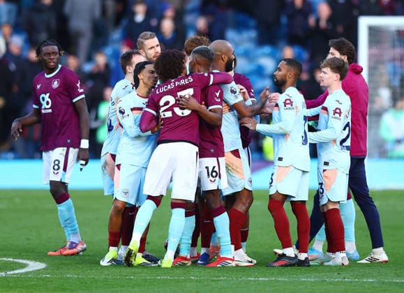 Burnley and Brentford players push each other at the end of the match Burnley v Brentford, Premier League, Football, Turf Moor, Burnley, UK - 28 Feb 2026Burnley Turf Moor United Kingdom EDITORIAL USE ONLY No use with unauthorised audio, video, data, fixture lists, club league logos or live services. Online in-match use limited to 120 images, no video emulation. No use in betting, games or single club league player publications. Copyright: xMattxWest Shutterstockx 16708420bm