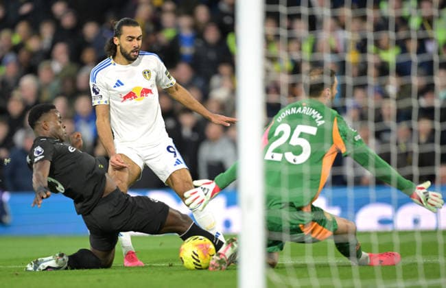 Dominic Calvert-Lewin of Leeds United shoots wide of Goalkeeper Gianluigi Donnarumma s goal as Marc Guà hi challenges Leeds United v Manchester City, Premier League, Football, Elland Road, Leeds, UK - 28 Feb 2026Leeds Elland Road United Kingdom EDITORIAL USE ONLY No use with unauthorised audio, video, data, fixture lists, club league logos or live services. Online in-match use limited to 120 images, no video emulation. No use in betting, games or single club league player publications. Copyright: xGreigxCowie Shutterstockx 16708637x