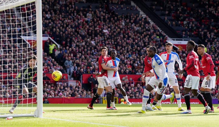 Manchester, England, 1st March 2026. A header from Maxence Lacroix of Crystal Palace (not in picture) goes past Senne Lammens of Manchester United, ManU into the net for the first goal during the Manchester United vs Crystal Palace Premier League match at Old Trafford, Manchester. Picture credit should read: Andrew Yates Sportimage EDITORIAL USE ONLY. No use with unauthorised audio, video, data, fixture lists, club league logos or live services. Online in-match use limited to 120 images, no video emulation. No use in betting, games or single club league player publications. SPI_023_AY_Man_Utd_Palace SPI-4566-0023