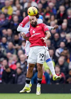 Manchester, England, 1st March 2026. Bryan Mbeumo of Manchester United, ManU challenged by Jaydee Canvot of Crystal Palace during the Manchester United vs Crystal Palace Premier League match at Old Trafford, Manchester. Picture credit should read: Andrew Yates Sportimage EDITORIAL USE ONLY. No use with unauthorised audio, video, data, fixture lists, club league logos or live services. Online in-match use limited to 120 images, no video emulation. No use in betting, games or single club league player publications. SPI_031_AY_Man_Utd_Palace SPI-4566-0031