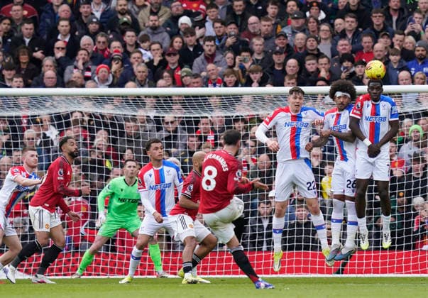 Manchester, England, 1st March 2026. Bruno Fernandes of Manchester United, ManU fires in a free kick during the Manchester United vs Crystal Palace Premier League match at Old Trafford, Manchester. Picture credit should read: Andrew Yates Sportimage EDITORIAL USE ONLY. No use with unauthorised audio, video, data, fixture lists, club league logos or live services. Online in-match use limited to 120 images, no video emulation. No use in betting, games or single club league player publications. SPI_033_AY_Man_Utd_Palace SPI-4566-0033