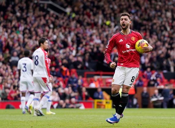 Manchester, England, 1st March 2026. Bruno Fernandes of Manchester United, ManU celebrates scoring from the penalty spot to make it 1-1 during the Manchester United vs Crystal Palace Premier League match at Old Trafford, Manchester. Picture credit should read: Andrew Yates Sportimage EDITORIAL USE ONLY. No use with unauthorised audio, video, data, fixture lists, club league logos or live services. Online in-match use limited to 120 images, no video emulation. No use in betting, games or single club league player publications. SPI_042_AY_Man_Utd_Palace SPI-4566-0042
