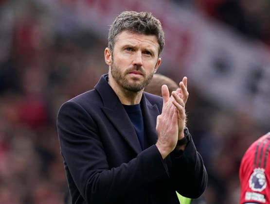Manchester, England, 1st March 2026. Michael Carrick head coach of Manchester United, ManU claps the fans during the Manchester United vs Crystal Palace Premier League match at Old Trafford, Manchester. Picture credit should read: Andrew Yates Sportimage EDITORIAL USE ONLY. No use with unauthorised audio, video, data, fixture lists, club league logos or live services. Online in-match use limited to 120 images, no video emulation. No use in betting, games or single club league player publications. SPI_085_AY_Man_Utd_Palace SPI-4566-0089
