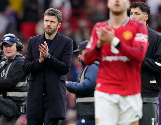 Manchester, England, 1st March 2026. Michael Carrick head coach of Manchester United, ManU claps the fans during the Manchester United vs Crystal Palace Premier League match at Old Trafford, Manchester. Picture credit should read: Andrew Yates Sportimage EDITORIAL USE ONLY. No use with unauthorised audio, video, data, fixture lists, club league logos or live services. Online in-match use limited to 120 images, no video emulation. No use in betting, games or single club league player publications. SPI_089_AY_Man_Utd_Palace SPI-4566-0087