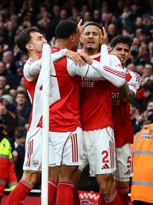 William Saliba of Arsenal celebrates scoring the opening goal with team-mates Arsenal v Chelsea, Premier League, Football, Emirates Stadium, London, UK - 01 Mar 2026London Emirates Stadium United Kingdom EDITORIAL USE ONLY No use with unauthorised audio, video, data, fixture lists, club league logos or live services. Online in-match use limited to 120 images, no video emulation. No use in betting, games or single club league player publications. Copyright: xMichaelxZemanek Shutterstockx 16708844q