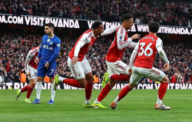 William Saliba of Arsenal celebrates scoring the opening goal with team-mates Arsenal v Chelsea, Premier League, Football, Emirates Stadium, London, UK - 01 Mar 2026London Emirates Stadium United Kingdom EDITORIAL USE ONLY No use with unauthorised audio, video, data, fixture lists, club league logos or live services. Online in-match use limited to 120 images, no video emulation. No use in betting, games or single club league player publications. Copyright: xMichaelxZemanek Shutterstockx 16708844s