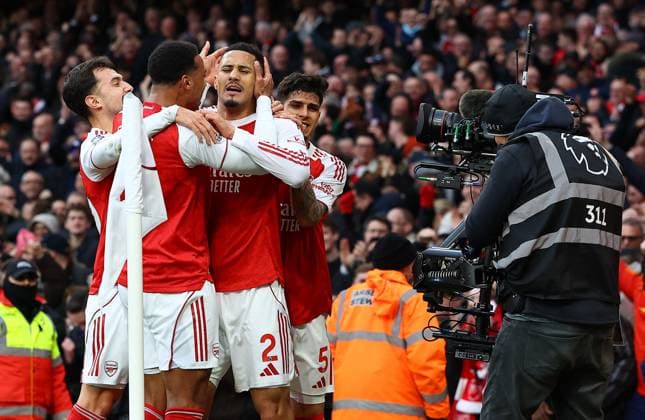 William Saliba of Arsenal celebrates scoring the opening goal with team-mates Arsenal v Chelsea, Premier League, Football, Emirates Stadium, London, UK - 01 Mar 2026London Emirates Stadium United Kingdom EDITORIAL USE ONLY No use with unauthorised audio, video, data, fixture lists, club league logos or live services. Online in-match use limited to 120 images, no video emulation. No use in betting, games or single club league player publications. Copyright: xMichaelxZemanek Shutterstockx 16708844aw