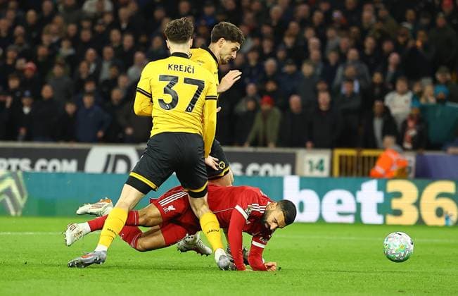 Mohamed Salah of Liverpool falls under pressure from Ladislav Krejci of Wolverhampton Wanderers Wolverhampton Wanderers v Liverpool, Premier League, Football, Molineux, Wolverhampton, UK - 03 Mar 2026Wolverhampton Molineux United Kingdom EDITORIAL USE ONLY No use with unauthorised audio, video, data, fixture lists, club league logos or live services. Online in-match use limited to 120 images, no video emulation. No use in betting, games or single club league player publications. Copyright: xMichaelxZemanek Shutterstockx 16719999q