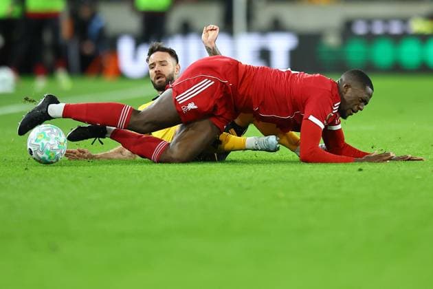 Ibrahima Konate of Liverpool is tackled by Adam Armstrong of Wolverhampton Wanderers Wolverhampton Wanderers v Liverpool, Premier League, Football, Molineux, Wolverhampton, UK - 03 Mar 2026Wolverhampton Molineux United Kingdom EDITORIAL USE ONLY No use with unauthorised audio, video, data, fixture lists, club league logos or live services. Online in-match use limited to 120 images, no video emulation. No use in betting, games or single club league player publications. Copyright: xMichaelxZemanek Shutterstockx 16719999w