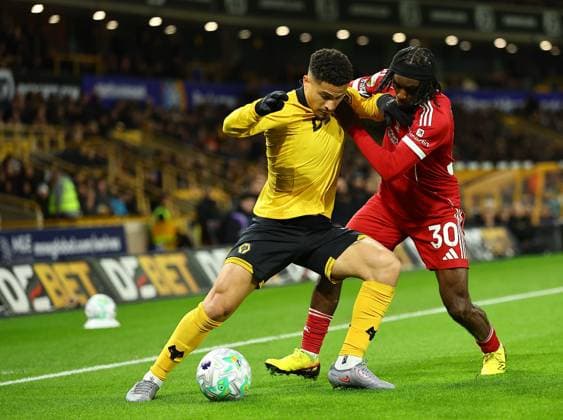 Joao Gomes of Wolverhampton Wanderers competes for the ball with Jeremie Frimpong of Liverpool Wolverhampton Wanderers v Liverpool, Premier League, Football, Molineux, Wolverhampton, UK - 03 Mar 2026Wolverhampton Molineux United Kingdom EDITORIAL USE ONLY No use with unauthorised audio, video, data, fixture lists, club league logos or live services. Online in-match use limited to 120 images, no video emulation. No use in betting, games or single club league player publications. Copyright: xMichaelxZemanek Shutterstockx 16719999y