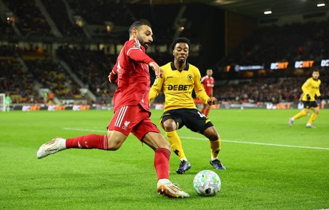 Mohamed Salah of Liverpool and Angel Gomes of Wolverhampton Wanderers Wolverhampton Wanderers v Liverpool, Premier League, Football, Molineux, Wolverhampton, UK - 03 Mar 2026Wolverhampton Molineux United Kingdom EDITORIAL USE ONLY No use with unauthorised audio, video, data, fixture lists, club league logos or live services. Online in-match use limited to 120 images, no video emulation. No use in betting, games or single club league player publications. Copyright: xMichaelxZemanek Shutterstockx 16719999dm