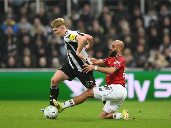 Bryan Mbeumo of Manchester United, ManU slides in with a challenge on Lewis Hall of Newcastle United Newcastle United v Manchester United, Premier League, Football, St James Park, Newcastle, UK - 04 Mar 2026Newcastle St James Park United Kingdom EDITORIAL USE ONLY No use with unauthorised audio, video, data, fixture lists, club league logos or live services. Online in-match use limited to 120 images, no video emulation. No use in betting, games or single club league player publications. Copyright: xRichardxLee Shutterstockx 16723964z