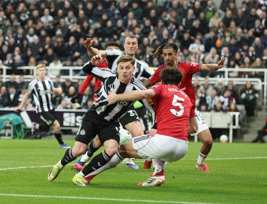 Newcastle Upon Tyne, England, 4th March 2026. Harry Maguire of Manchester United, ManU blocks Harvey Barnes of Newcastle United during the Newcastle United vs Manchester United Premier League match at St. James Park, Newcastle Upon Tyne. Picture credit should read: Nigel Roddis Sportimage EDITORIAL USE ONLY. No use with unauthorised audio, video, data, fixture lists, club league logos or live services. Online in-match use limited to 120 images, no video emulation. No use in betting, games or single club league player publications. SPI_032_NR_NEWC_MANC SPI-4578-0030