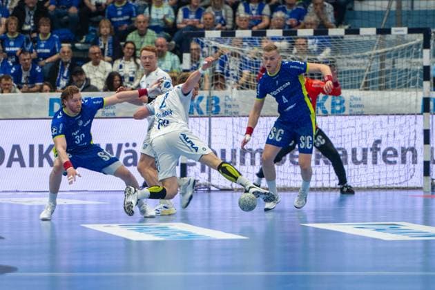 Ellidi Snaer Vidarsson, Kreislaeufer, (VfL Gummersbach 4), Samuel Zehnder, Aussen (TBV Lemgo Lippe 4), Tom Kiesler, Rueckraum, (VfL Gummersbach 30), VfL Gummersbach vs. TBV Lemgo Lippe, Daikin Handball Bundesliga, Herren , 24. Spieltag, 05.03.2026 Gummersbach NRW Deutschland