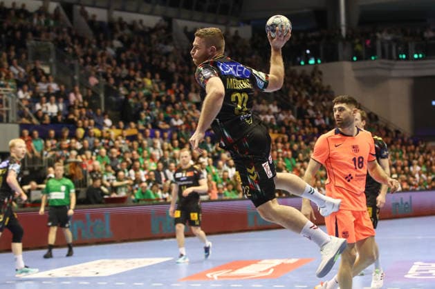 05.03.2026, xtgx, Handball, EHF Champions League, SC Magdeburg - FC Barcelona, Barca v.l. Lukas Mertens (Magdeburg, 22) wirft Tor, Torschuetze, erzielt Tor, Treffer, scores the goal Magdeubrg