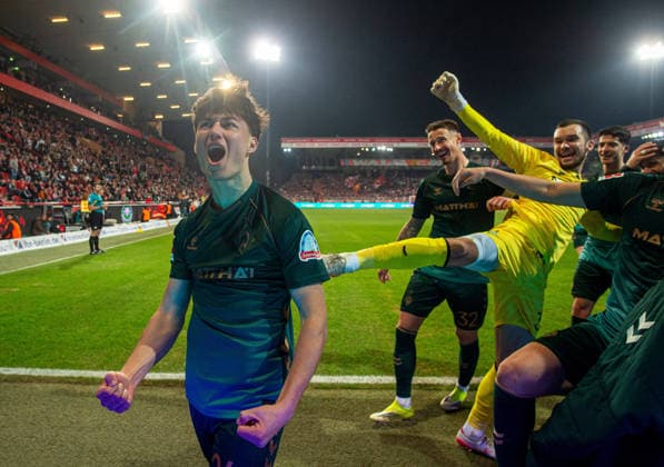 Fußball, Herren, Saison 2025 2026, 1. Bundesliga (25. Spieltag), 1. FC Union Berlin - SV Werder Bremen, v.l. Patrice Covic (Bremen), Marco Friedl (Bremen), Torhüter Mio Backhaus (Bremen), Julian Malatini (Bremen), Jubel nach Tor zum 1:4, 08.03.2026, Copyright: xSebastianxRäppold MatthiasxKochx