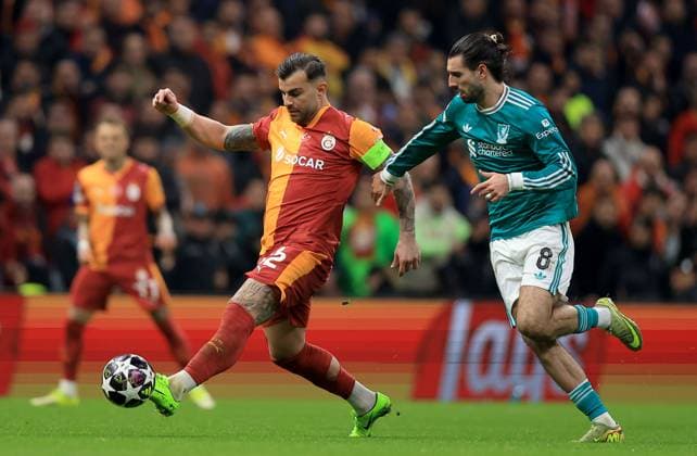 Abdulkerim Bardakci of Galatasaray in action against Dominik Szoboszlai of Liverpool Galatasaray v Liverpool, UEFA Champions League, Round of 16, First Leg, Football, RAMS Park, Istanbul, Turkiye - 10 Mar 2026Istanbul RAMS Park Turkey EDITORIAL USE ONLY No use with unauthorised audio, video, data, fixture lists, club league logos or live services. Online in-match use limited to 120 images, no video emulation. No use in betting, games or single club league player publications. Copyright: xGeorgexTewkesbury Shutterstockx 16740258az