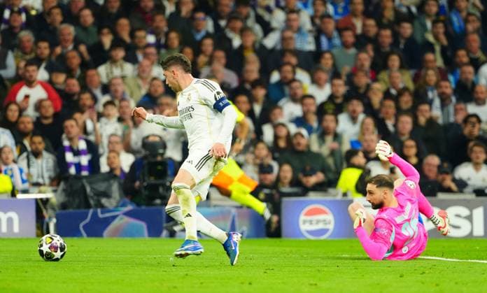 Federico Valverde of Real Madrid goes around Manchester City goalkeeper Gianluigi Donnarumma and scores the opening goal Real Madrid v Manchester City, UEFA Champions League, Round of 16, First Leg, Football, Bernabeu, Madrid, Spain - 11 Mar 2026Madrid Bernabeu Spain EDITORIAL USE ONLY No use with unauthorised audio, video, data, fixture lists, club league logos or live services. Online in-match use limited to 120 images, no video emulation. No use in betting, games or single club league player publications. Copyright: xJavierxGarcia Shutterstockx 16746741w