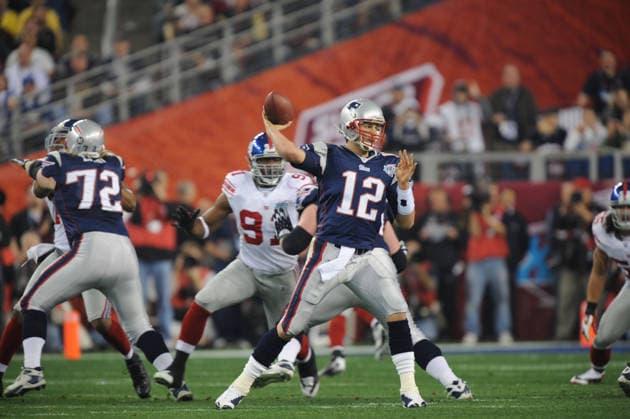 Feb 03, 2008 - Glendale, Arizona, USA - New England Patriots quarterback TOM BRADY passes the ball in the first quarter during the first quarter of Super Bowl XLII at University of Phoenix Stadium. The New England Patriots who went unbeaten during their 2007 season faced the New York Giants. Copyright: xKarlxMondonx