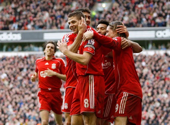 Steven Gerrard of Liverpool celebrates scoring the third goal Copyright: x-x