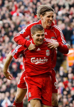 Steven Gerrard of Liverpool celebrates scoring the third goal with Fernando Torres Copyright: x-x
