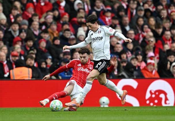 Harry Wilson of Fulham is tackled by Neco Williams of Nottingham Forest Nottingham Forest v Fulham, Premier League, Football, City Ground, Nottingham, UK - 15 Mar 2026Nottingham City Ground United Kingdom EDITORIAL USE ONLY No use with unauthorised audio, video, data, fixture lists, club league logos or live services. Online in-match use limited to 120 images, no video emulation. No use in betting, games or single club league player publications. Copyright: xAnnaxGowthorpe Shutterstockx 16757313al